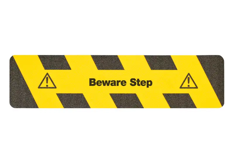 Strato antiscivolo m2™, marc. direzionale, nero/giallo, “Beware Step” striscia 150 x 610 mm